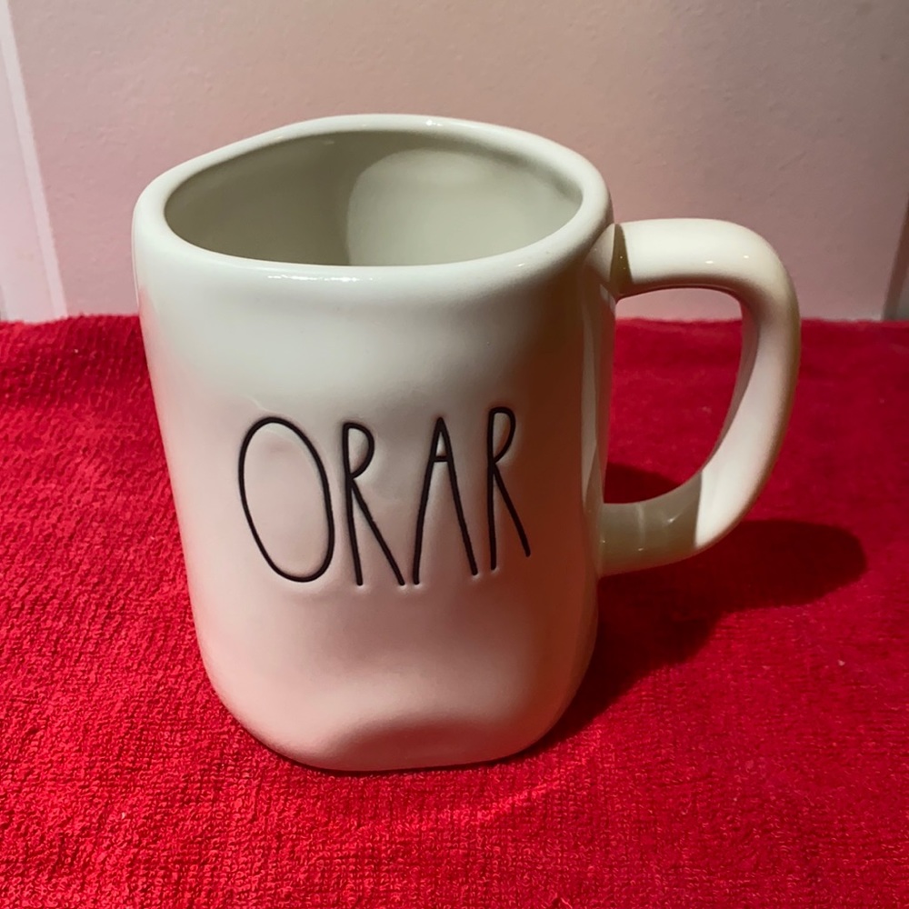 Rae Dunn mug with “Orar” text
